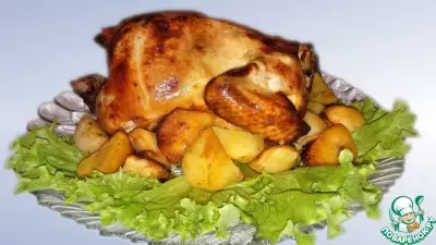 Запеченная курица с яблоками и черносливом