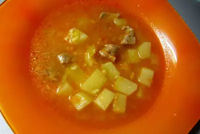 Суп с варено копченой свиной грудкой и пшеном