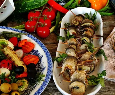 Салака-гриль, фаршированная кускусом с оливками.