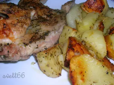 Цыпленок с картофелем запеченный с лимонным соком и орегано в оливковом масле ( критская кухня)