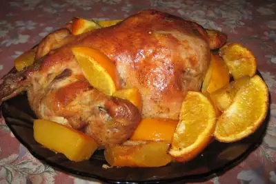 Ароматная курица, запеченная с апельсинами