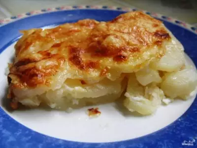 Картошка, запеченная под сыром в духовке