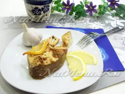 Запеченный толстолобик с лимоном в духовке